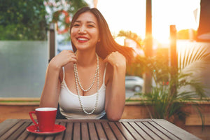 girl smiling at sunset after using cbd